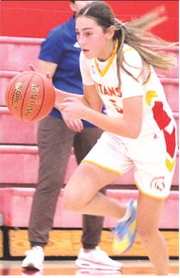 Lady Titan Eighth Grader, Kip Saporito, drives the court during a home game against St. Mary’s-Colgan, October 30. Columbus moves to the midway point of their season with games in Frontenac, today at 5:30 p.m. They will host Galena, Thursday, at 1 p.m.