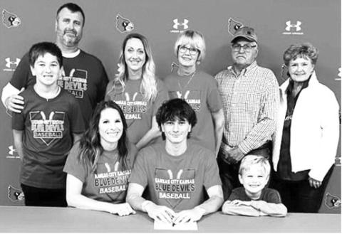 Cohen Epler, Webb City High School Senior, signed a National Letter of Intent to extend his baseball career with the Kansas City Kansas Community College Blue Devils. Members of his local family were on hand last fall for the official signing. Seated: Ashlee Epler, Cohen Epler, and Cru Epler. Standing: Conlin Epler, Charlie Epler, Lizzie Epler Roberts, Marilyn Epler,Tom Epler and Jane Ann Turner. Courtesy photo.
