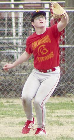 Jett Tanner, taking reps in right field during the Columbu Titan Baseball practice, Thursday, at Bomber Field in the Community Field Ball Park. The Titans open on the road, Tuesday, in Quapaw, Okla.