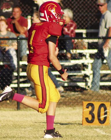 Denver Hughes, broke away down the east sideline for a 46-yard touchdown, the first six points in the Columbus Eighth Grade, 34-12, win over Girard, Tuesday at Titan Stadium in the teams final game of the season.