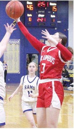 Lady Titan Senior, Katelyn Draeger, snagged a rebound late in the game from the Lady Rams the Columbus loss at Riverton, 20-49, December 19. Lady Ram Junior, Chloe Green, watches from the free throw line.