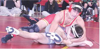 Titan Senior, Jayden Rodriguez, right, takes control, of his match, Saturday, in the 2025 Columbus Duals Tournament at the CUHS Gymnasium. Jayden won five matches by fall and one by forfeit to sweep the day and earn a win in the 157 pound weight class.