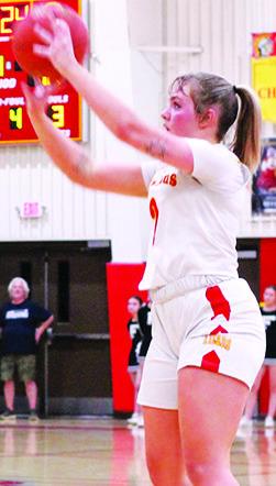 Lady Titan Senior, Graci Major, shoots one of her five, three pointers on the night in the 47-36, Columbus win over Frontenac, Tuesday, at the CUHS Gym. The victory sends the local round-ballers to the semi-final round of the Kansas Class 3A Sub-State Tournament in Caney, tonight, against Cherryvale