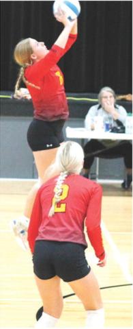 Lady Titan Senior, KT Lopp, returns the ball over the net during the bracket play game against Chanute, Saturday, at the Frontenac High School Invitational Volleyball Tournament. The Lady Titans won two matches in three sets and lost three matches in a full day of volleyball action. Columbus will have another long day on the court in annual Oswego Tournament, tomorrow, beginning at 8 a.m.