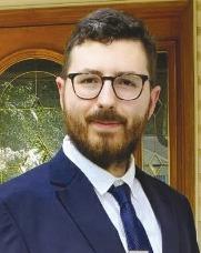 Robinson graduates with degree in law