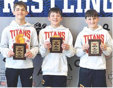 Blaze Bowman (14U, 100-pounds) and Cam Carter (12U, 95-pounds placed fifth in the USAWKS Kansas State Wrestling Tournament, March 14-15, in Topeka. Teammate, Briggs Johnson, placed sixth to earn a spot on the podium in the 10U 90-pound weight class. Courtesy photo.
