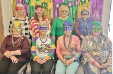 PEO celebrates Mardi Gras at meeting