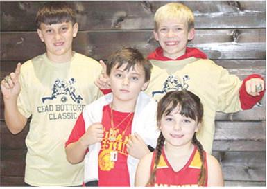 Briggs Johnson, Bearett Bowin, Lucas Natalini, and Jolie Bowin wrestled at the Chad Bottorff Memorial Classic Wrestling Tournament, Saturday, in Springdale, Ark. Jolie placed fourth and all the boys brought home gold rings. Courtesy photo.