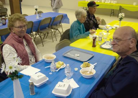 Alice and Ralph White were among those enjoying the recent bean feed sponsored by the Columbus Lions Club. The annual event always draws a crowd and is very popular with area residents.