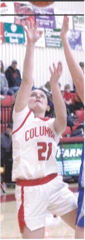 Sophomore, Americus Woodcock, shoots for two in a recent home game vs. Colgan. Friday in Riveton, Americus led the Lady Titan Junior Varsity to a 3027 win over the Lady Rams.