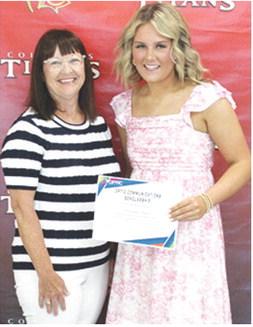 Kenadie Carter received a $1,000 Optic Communications Scholarship from Jane Rhinehart during the 2025 Senior Assembly at the CUHS Gymnasium, May 16.