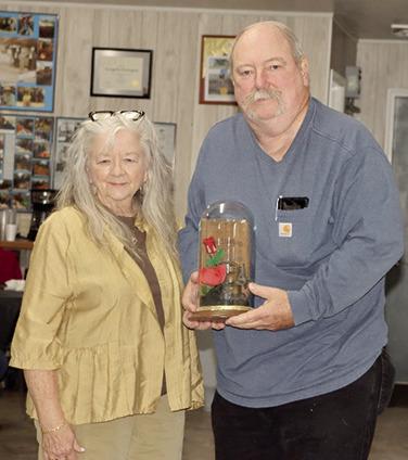The annual Miners Lamp award was presented to Joyce and Roe Parsons at the Big Brutus annual meeting at the Weir Senior Center Saturday evening. The Parsons were recognized for their volunteer efforts over the years on behalf of Big Brutus. He was particularly recognized for the playground equipment he donated to the Big Brutus Park and the work repairing the bell from the City of West Mineral. Photo by Emmett Sullivan.