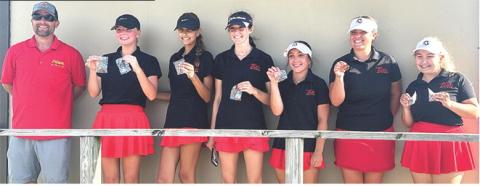 The Lady Titan Golf Team placed third in the Chanute Invitational Golf Tournament, Monday. Freshman, Cali Carpino, earned her first individual title to lead the team in the field of 45 golfers. Team members are Head Coach Jerry Smiley, Cali, Addison Johnson, freshman; Natalie Wary, junior; Hannah Noel, junior; Fallon Smiley, freshman; and Amory Neely, junior. Courtesy photo.