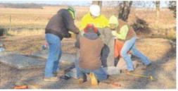 Frontenac High School students who are enrolled in Masonry in Fort Scott Community College’s CTEC program spent their morning December 20, repairing the vandalized headstones at Star Cemetery near West Mineral.