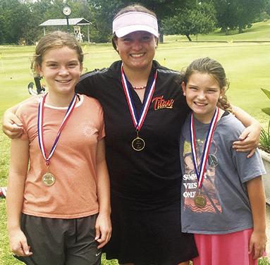 Lyndee Smiley placed second in the girls 9-11 age group at the SEK League Junior Golf Tournament in Independence, Thursday. Fallon Smiley took first place in the girls 12-14 age division, and Alaina Smiley finished fourth in the girls 9-11 age division. The sisters, representing the Columbus Rec Junior Golf Program, each earned a medal for their collections.