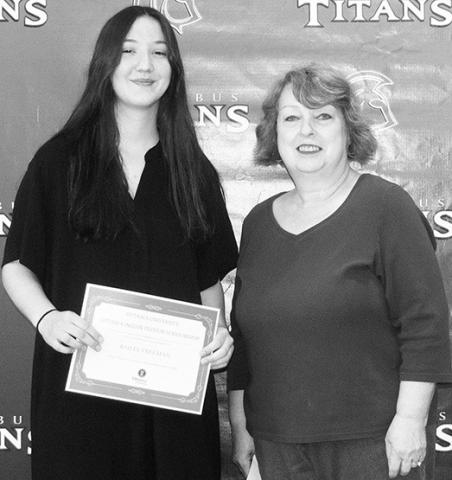 Bailie Freeman received an Ottawa Indian Tuition Scholarship in the amount of $180,000 from Ottawa University during the CUHS Senior Assembly, May 19, at the high school gym. Senior English Instructor, Karen Langerot, presented the award.
