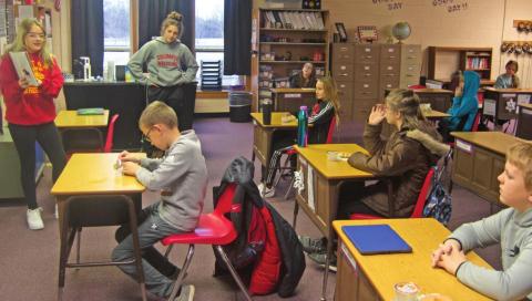 Titans enjoy breakfast with a book