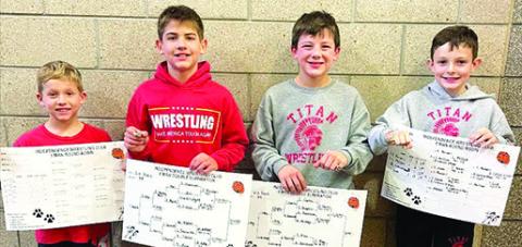 Baylor Bowman, Blaze Bowman, Cam Carter, and Tanner Scott earned gold rings for winning the age division/ weight class at the Bulldog Classic Wrestling Tournament, Sunday in Independence. Courtesy Photo.
