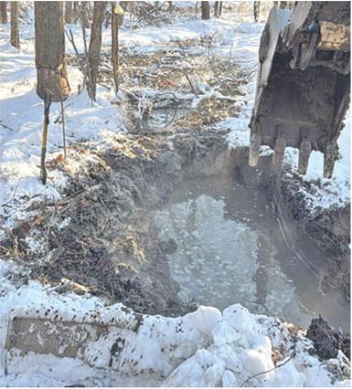 Despite the frigid temperatures, crews with Cherokee County Rural Water District #3 were out repairing a large leak. The leak was located in the area west of Southwest 50th and Highway 166. A three inch line busted in a casing where it goes under the Creek. Crews were able to quickly repair the leak. Courtesy photo.