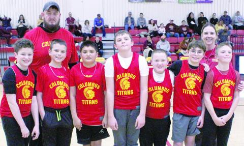 Members of the sixth grade Columbus Recreation Titan Basketball Team were introduced February 10 at the Titan varsity basketball games with Girard. Jake Wary, Trevor Lacen, Chance Briggs, Tanner Thompson, Kip Noel, Kasen Sallee, and Jace Mooney are shown with their coaches Adam Sallee and Ryan Lacen.