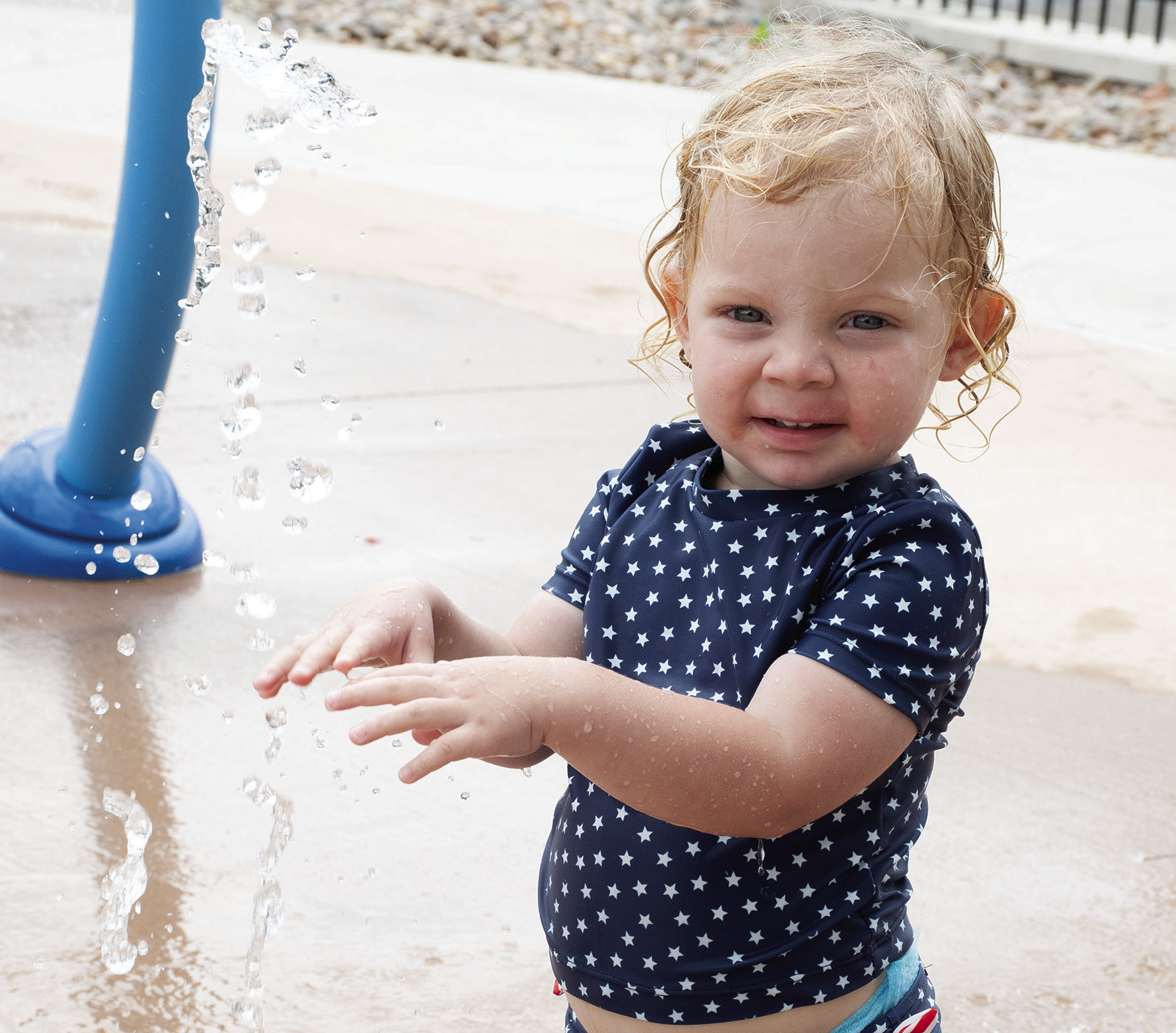 On a warm day there is no place like the Columbus splash pad for cooling off. Inola Smith was enjoying the morning with some fun in the water.