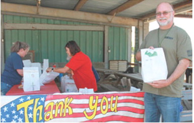 A luncheon for veterans and first responders was held Friday, September 11 at the Lions Shack on the Cherokee County Fairgrounds. This is an annual event to honor local heroes for their dedication and service. Terry Clugston was picking up a lunch as workers in the background packed more meals for delivery and pick up. The luncheon was free of charge.