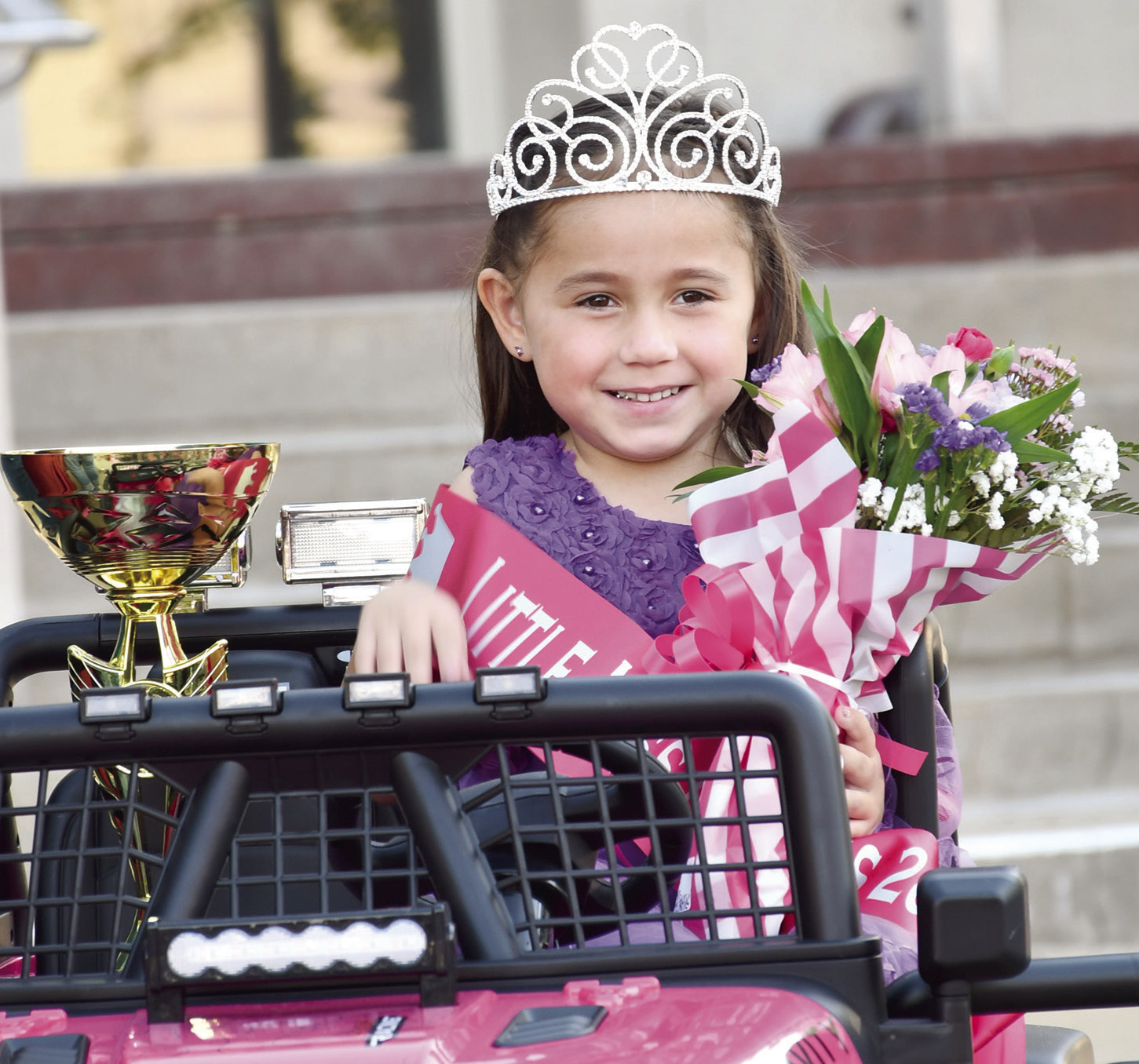 The Annual Little Mr. and Miss Columbus contest brought top awards to KayDee Richardson (above) and Kohen Robinson (below) who each won a motorized jeep in addition to their crowns, trophies and goodie bags. Across all candidates, more than $8,000 was raised for next year’s Columbus Day entertainment.