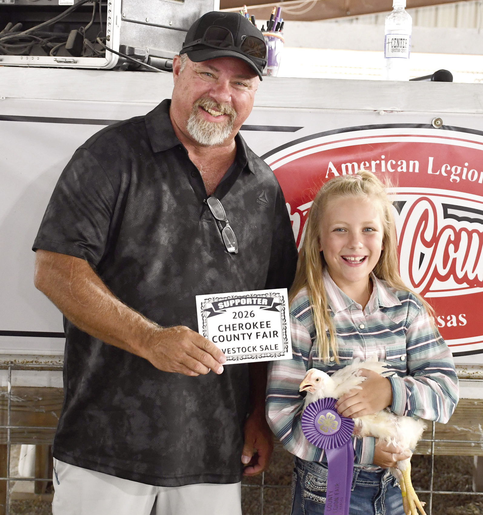 Stetson Danley’s Grand Champion chicken brought in a $650 premium from Puddle Jumpers Liquor Store represented by Rodney Oels.
