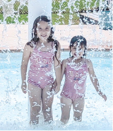 With school starting, the pool is now closed for the season. Throughout the summer numerous youngsters took advantage of the cool break. Wearing matching USA swimsuits, Kinsleigh Lyman and Brynleigh Lyman attended the Columbus Free Swim sponsored by the city.