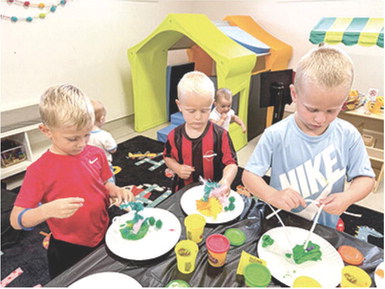 Youngsters under five had the opportunity to imagine and create their own dinosaur habitat at the Columbus Public Library this week. Lincoln Knopp, Beckham Eaton and Barrett Eaton use Play-Doh, pipe cleaners and other craft items to create their dino lands. The Library hosts multiple kid’s events throughout the summer.