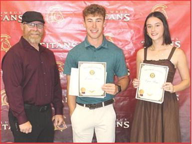 Aron Davolt presented the American Legion Awards and $150 Scholarship to Columbus Unified High School Seniors, Lemmie Stone and Piper Hayes, during the 2026 Senior Award Assembly, May 15, at the CUHS Gymnasium.