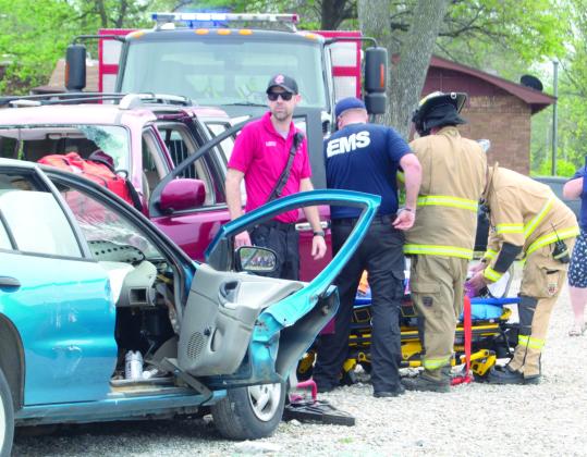 Fire Chief Steve Burton (above), was in charge of the mock display but he was also involved in helping the Columbus fire fighters remove the victims from the vehicles.