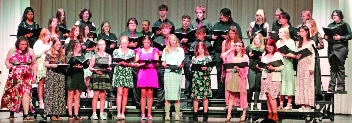 Titan Choir held their Spring Concert recently. Members of the combined Titan Choir performed Hitch A Ride by Marry Donnelly, arranged by George Lo. Strid. The choirs are under the direction of Stacey Struble.