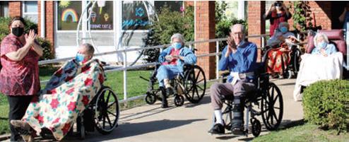 A few residents of Medicalodges were able to sit outside to watch the pep rally put on by students at Columbus High School. COVID restrictions have limited visitors to the facility and the pep rally was planned to lift the spirits of the residents.