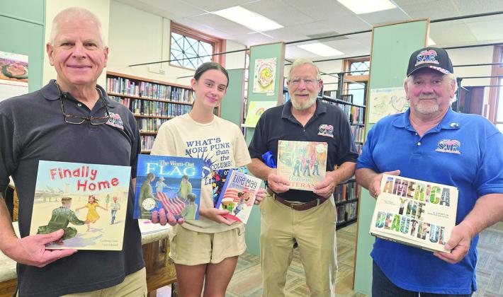 Little Balkans SAR chapter, Pittsburg donated books to the Columbus Library in honor of the America 250 celebration. The chapter is pleased to support the library and contribute to the community’s recognition of this historic milestone. Those present for the donation were Martin Dupslaff, Piper Hayes, Rick Parmele and John Gilpin. Courtesy photo.