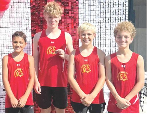 The Columbus Junior High School Seventh Grade Boys Cross Country Team placed first at the Oswego Invitational Meet, Thursday, in Oswego. Team members, Kross Davis placed 15th; Eamon Wilkins placed sixth; Lucas Epler placed ninth; and Tucker Siemer placed seventh on their way to the team title. Courtesy photo.