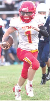 Titan Eighth Grader, Liam Casey, scored both twopoint conversions in the Columbus win in Galena, 16-0, Thursday. Photos by Kristin Sharp.