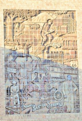 The mural on the side of the American Bank depicts the history of the City of Baxter Springs from its early years. It highlights mining, the cowtown days and baseball heritage to name a few.