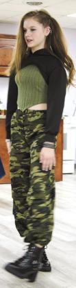 Sophie Elmore displayed her camo themed outfit at the annual 4-H Style Revue Saturday, June 27 at the Extension office in Columbus.