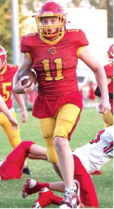 Wyatt Linn, Titan Eighth Grader, ran in two, 2-point conversions and a five-yard touchdown in the Columbus Junior High win, 16-6, over Baxter Springs, September 17, at Titan Stadium. Photo by Kristin Sharp.