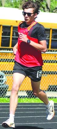Titan Freshman, Drake Laurance, placed third in the 1600 Meter Run at the Thad Clements Invitational Meet, Friday, in Chanute.