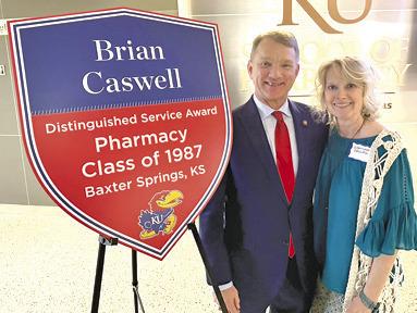 Caswell receives KU Distinguished Service Award
