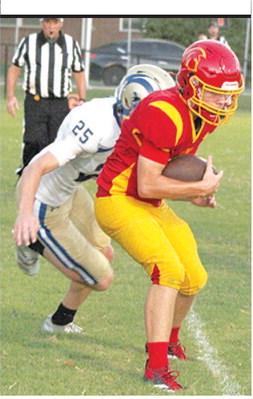 Evan Walters, Titan Freshman, makes the catch from freshman quarterback, Blaze Bowman, just inside the goal line for the two-point conversion in the Columbus win, 24-12, over Riverton, Monday at Titan Stadium.