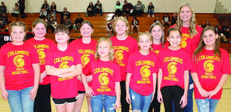 The Lady Titan Fifth Grade Columbus Rec Team was introduced during the Varsity halftime of the Lady Titans game against St. Paul. Team members are back row: Alivia Perdue, Gracie Stanley, Lydia Wilkins, Sammi Ohmart, and Coach Karsyn Youngblood. Front row: Piper Cain, Grace Alderman, Lexie Webb, Zoe Hale, Kiptyn Saporito, and Iyionna Basauri.