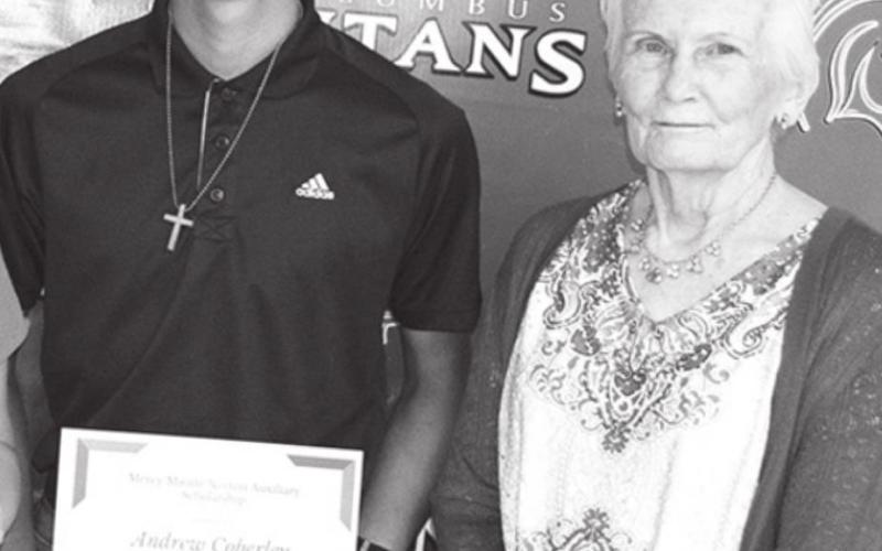 Sharon Koons and Lucille McNemar (not pictured) presented the $300 Mercy Maude Norton Auxiliary Scholarship to Andrew Coberly.