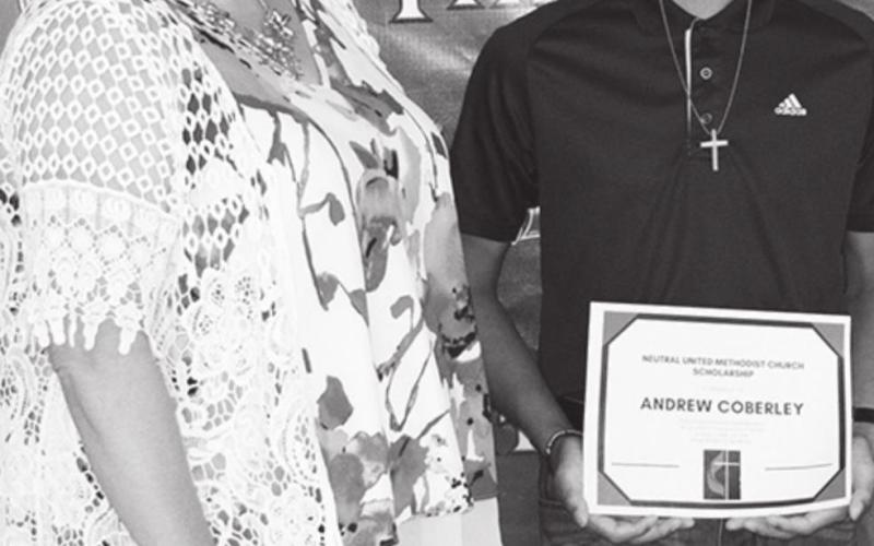 Sarah Maxton, CUHS Spanish Instructor and church representative, presented a $1,000 Neutral United Methodist Church Scholarship to Andrew Coberley.