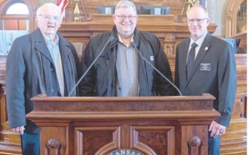 During City Government Day at the Kansas State Legislature, Columbus Council member Tom Pryor and Mayor Grant Spieth visited with State Representative Dale Helwig during a break in the session.