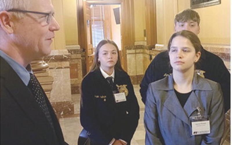 On a recent FFA trip to the State Capital, Grace Eshelman, Alex Welch and Lauren French spent some time talking to representative Dale Helwig. Courtesy photo.