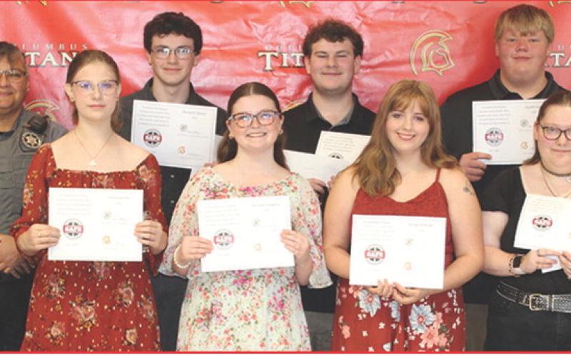 Members of the 2026 Senior Class serving on Officer Anne Sharp’s S.A.F.E. Team received certificates and cords to be worn during graduation from Officer Sharp during the Senior Awards Assembly, May 15, at the Columbus Unified High School Gymnasium. Team members are front row: India Daniels, Kemper Dobkins, Emily Forkner, and Lizah Spencer. Back row: Officer Anne, Broland Gibson, Ty Garrett, and Austin Ash. Not pictured, Brylea Taylor.