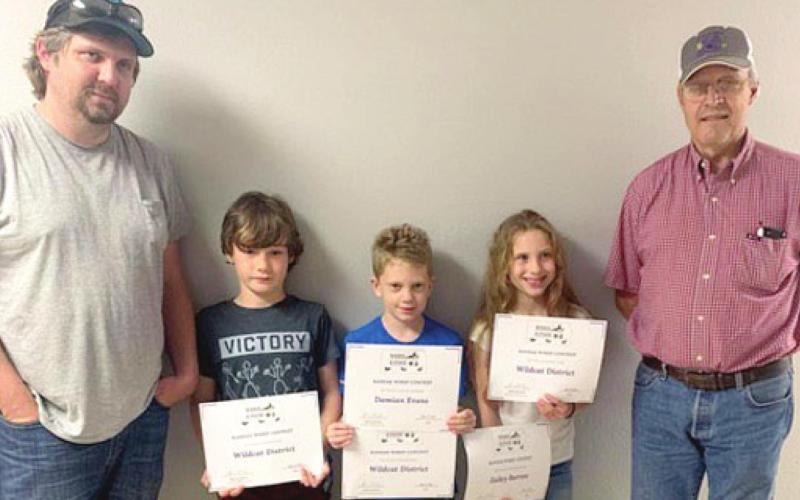 Recently Wildcat District 4-H members competed in the Kansas Wildlife Habitat Education Program. Left to right are Coach Brian Elsworth, Raylan Elsworth, Damien Evans, Zailey Burrow and Coach Dan Peterson.